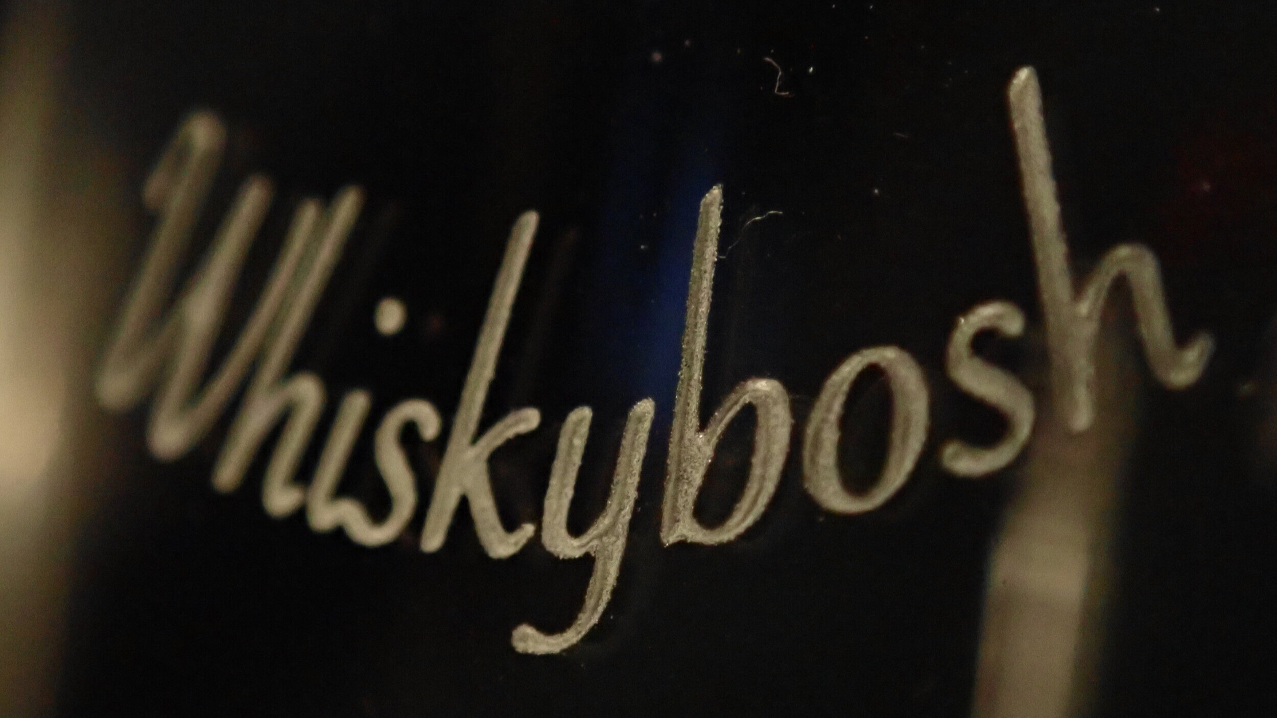 Engraved malt scotch whisky glass.